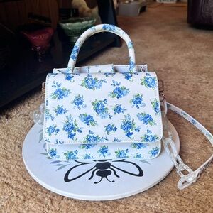HOUSE OF WANT WE ARE CHIC VEGAN LEATHER TOP HANDLE CROSSBODY IN BLUE FLORAL.
